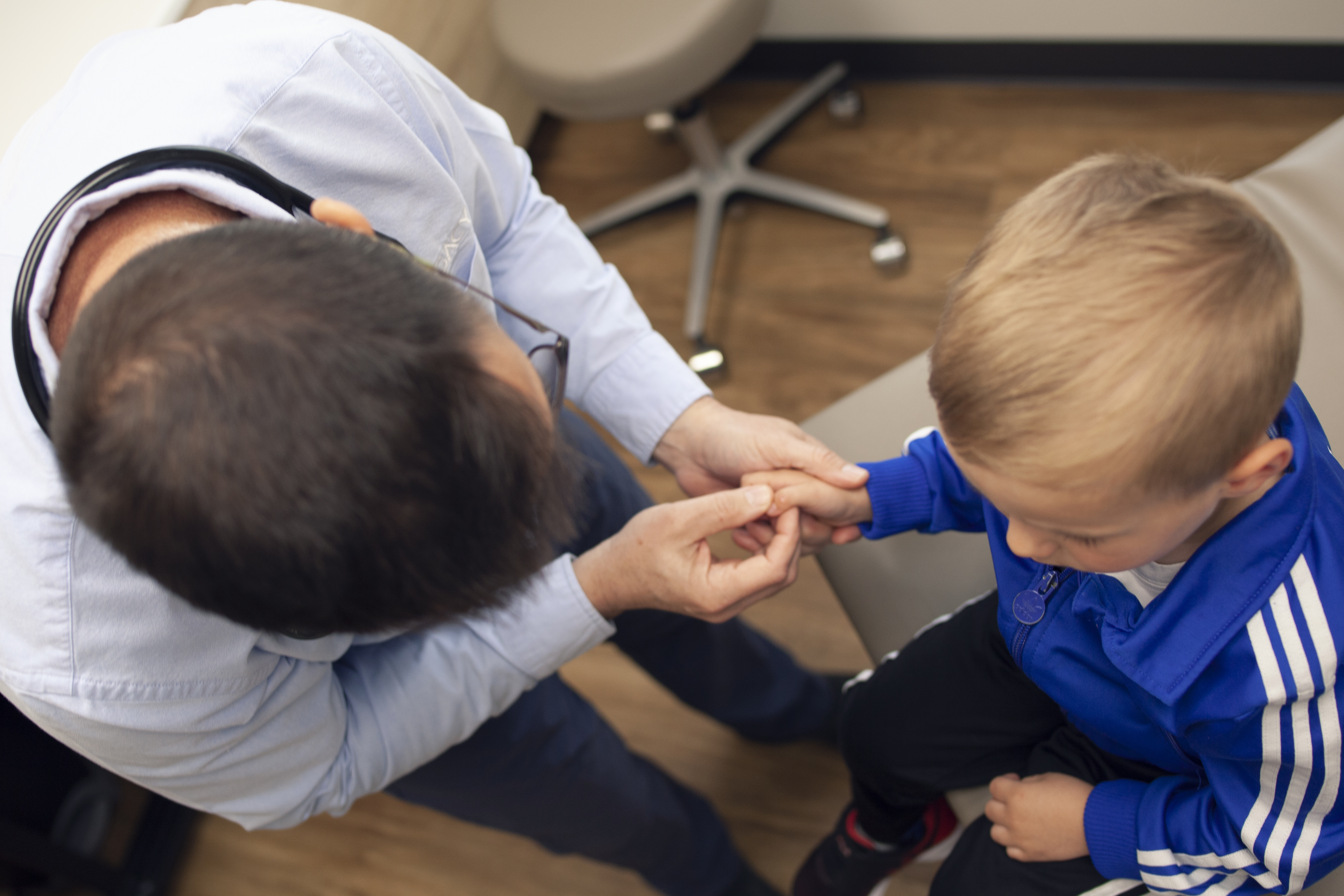 Dr. Eric Miller with a young patient